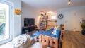 Einliegerwohnung - Wohn-/Schlafbereich mit Terrasse und offener Küche