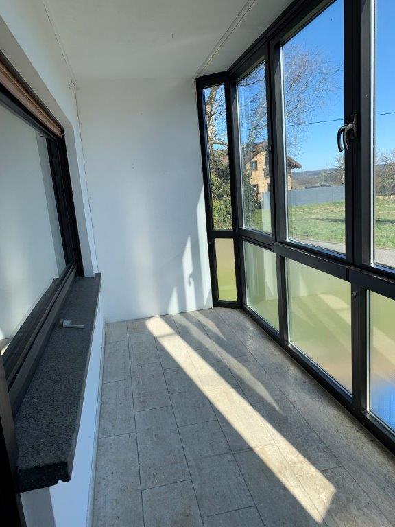 Großzügige Wohnung mit Garten, Garage und verglastem Freisitz - Foto 4